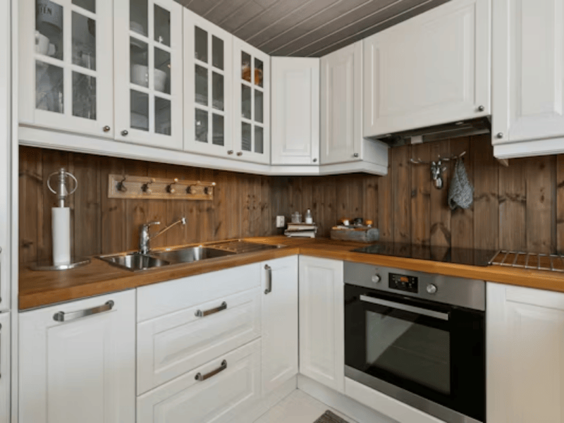 Bright kitchen interior painting - white walls with natural light