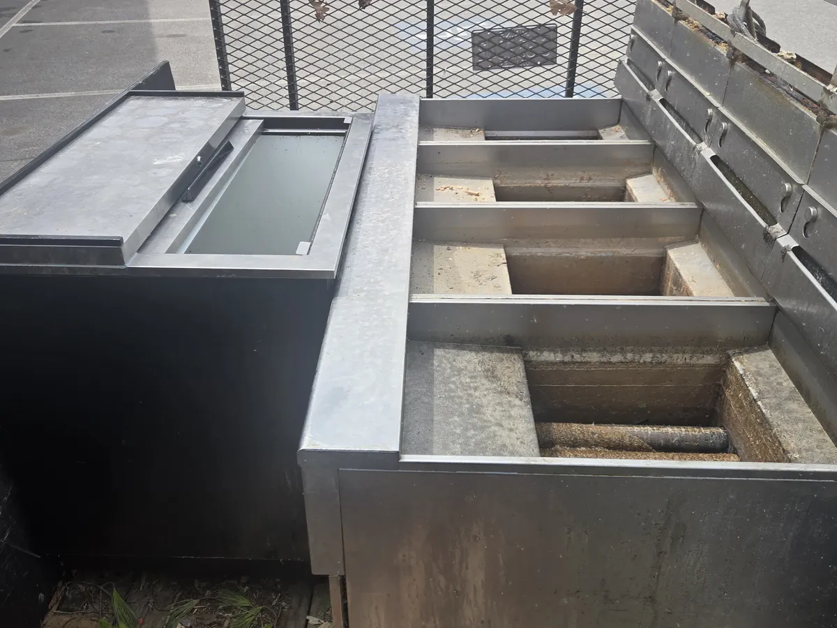 Commercial kitchen equipment cleared from a restaurant